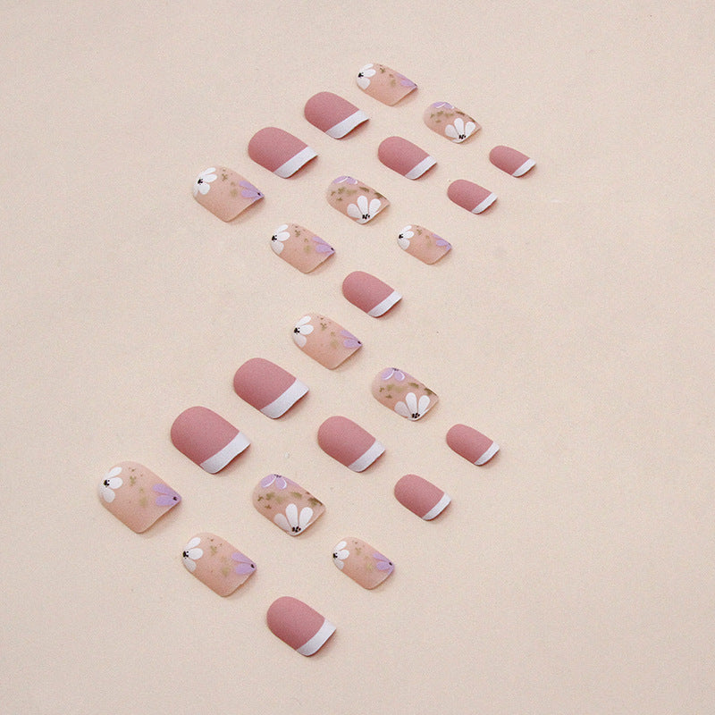 Daisy Dreams press-on artificial nails with floral daisy design, easy apply fake nails for women